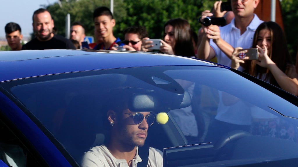 Neymar arrives at Barcelona training ground amid rumours he is set to move to PSG. Photograph: Manu Fernandez/AP
