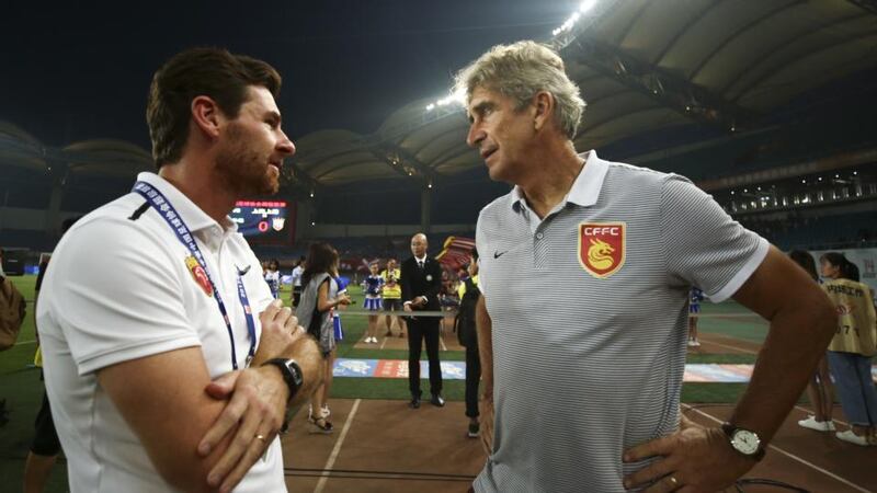 Chinese Super League: André Villas-Boas of Shanghai SIPG talks with Manuel Pellegrini of Hebei China Fortune after their match in August. Photograph: VCG via Getty