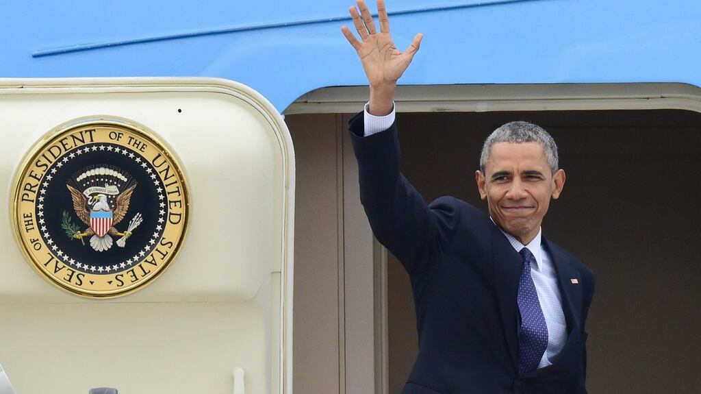 Barack Obama boards Air Force One in Hanover, Germany, at the conclusion of his two-day visit to Germany. Photograph: Hauke-Christian Dittrich/EPA