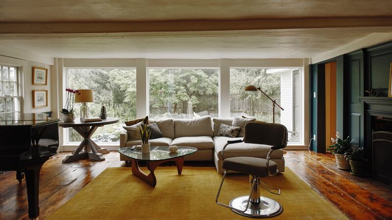 The piano room of  the circa-1760s farmhouse. Photograph: Tony Luong/New York Times