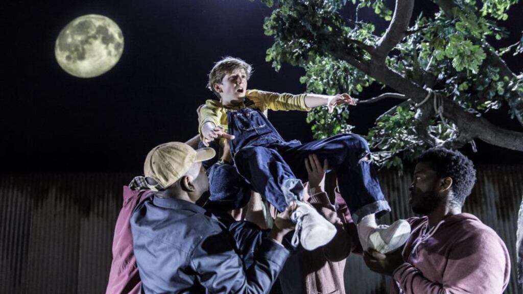 Harry Bennett (Jem) is held aloft. Photograph: Johan Persson