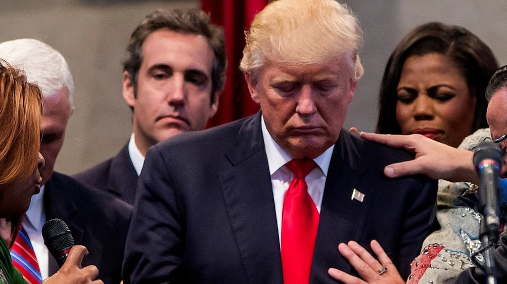 Michael Cohen, behind Donald Trump on the left, at a campaign stop at the New Spirit Revival Center in Cleveland, Ohio, on September 21st, 2016. Photograph: Eric Thayer/New York Times