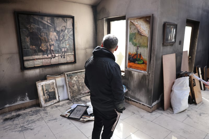 Artist Pat Curran in May in the wake of the
arson attack on his home in a case of mistaken identity. Photograph: Dara Mac Dónaill