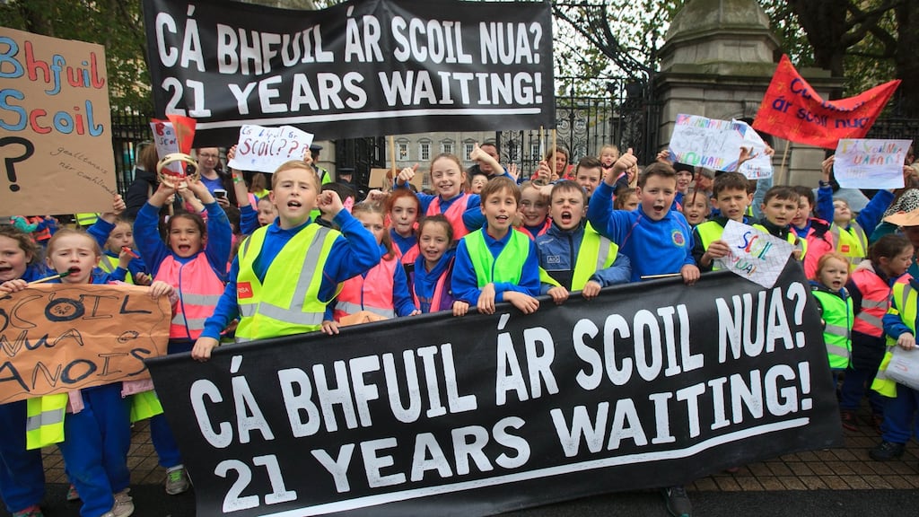 Irish-medium schools tend to be oversubscribed and students often end up having to travel greater distances to schools located in other districts or are forced to attend English-medium schools when the option of Irish-medium education is not available to them. Above: Schoolchildren from Gaelscoil Chnoc Liamhna during a protest outside Leinster House in 2017. Photograph: Gareth Chaney/Collins