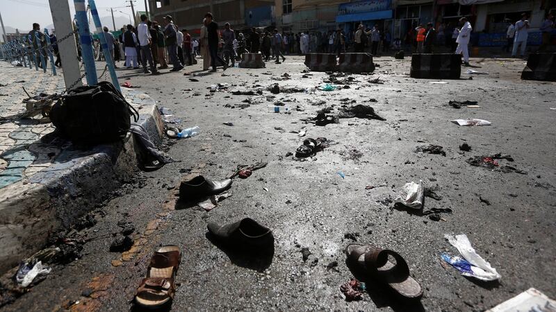 The shoes of victims are seen at the site of the blast in Kabul, Afghanistan. Photograph: Omar Sobhan/Reuters