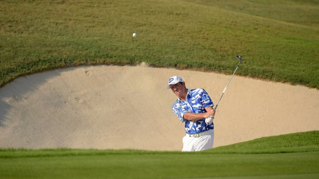 Joint leader Scott Hend plays a bunker shot during the second round of the True Thailand Classic at the Black Mountain Golf Club in Hua Hin, Thailand. Photograph: Paul Kakatos/AFP/Getty