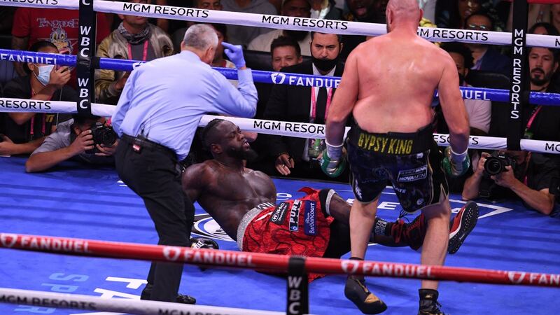Deontay Wilder is sent to the floor during the WBC heavyweight title fight. Fury stopped Wilder in the 11th to end their trilogy of bouts with consecutive victories. Photograph: Robyn Beck/Getty Images