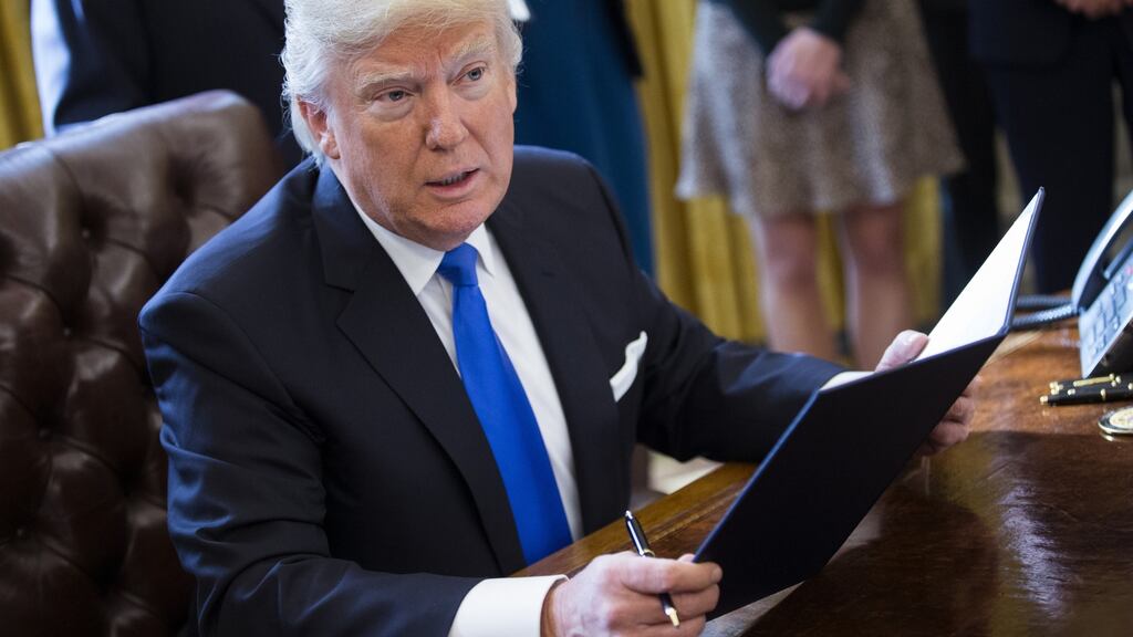 US president Donald Trump speaks after signing executive orders related to the oil pipeline industry in the Oval Office of the White House. Photograph: Shawn Thew-Pool/Getty Images