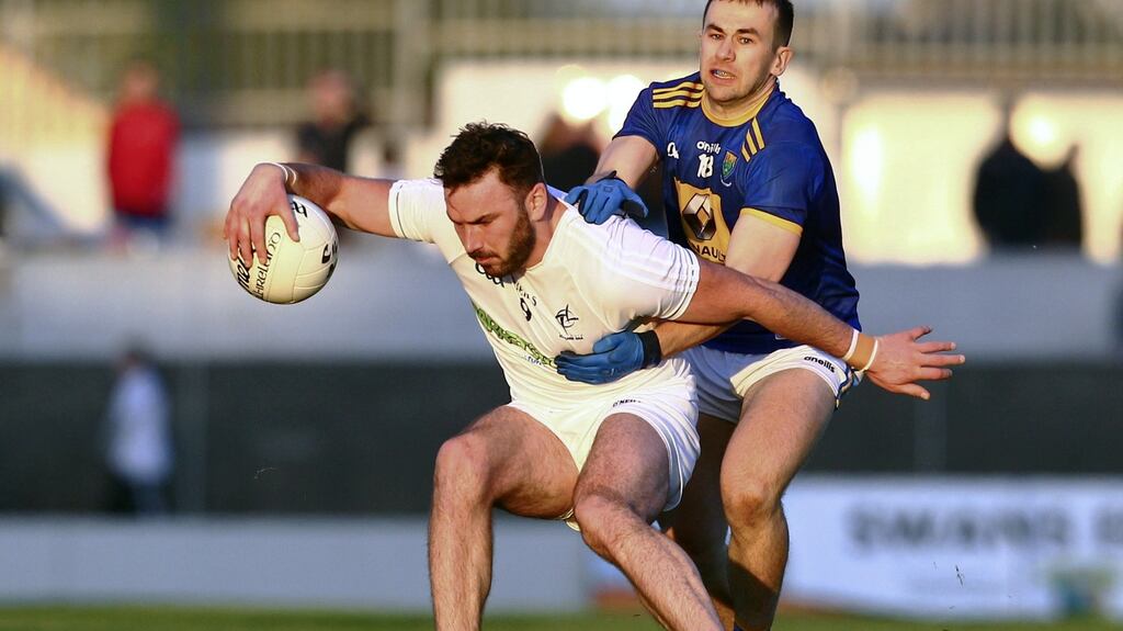 Kildare’s Fergal Conway is tackled by Wicklow’s Daniel Keane. Photograph: Ken Sutton/Inpho
