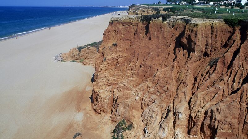 Cliffs next to a beach, Vale do Lobo, Algarve, Portugal.