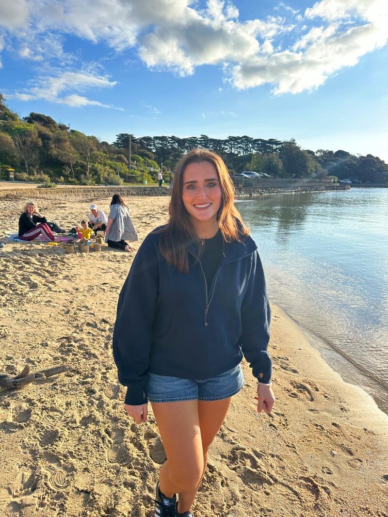 Helena O’Sullivan (25), a pharmacist from Co Kerry is now living and working in Melbourne. Pic supplied to Olivia Powell for news feature in August 2024 shows her on Mornington Beach not far down the coast from Melbourne