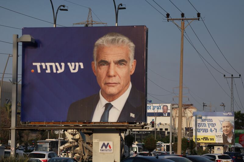 An electoral banner for Yesh Atid party leader Yair Lapid in Tel Aviv: The best the anti-Netanyahu bloc can hope for is to block Netanyahu’s return to power while Lapid stays on as caretaker prime minister. Photograph: Ahmad Gharabli