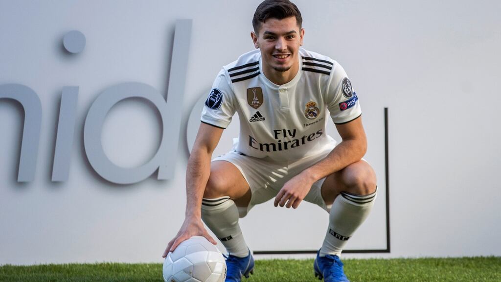 Real Madrid’s new midfielder Brahim Diaz poses during his presentation at Santiago Bernabeu stadium in Madrid, on Monday. Photograph: Rodrigo Jimenez/EPA