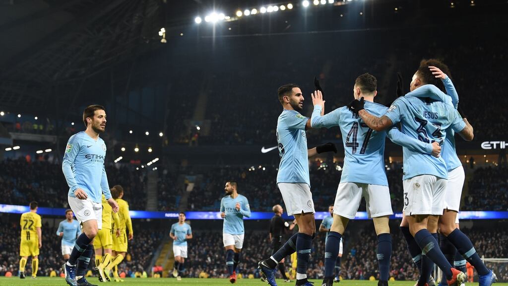 Manchester City’s Brazilian striker Gabriel Jesus celebrates after scoring his fourth goal against Burton Albion. Photograph: Getty Images