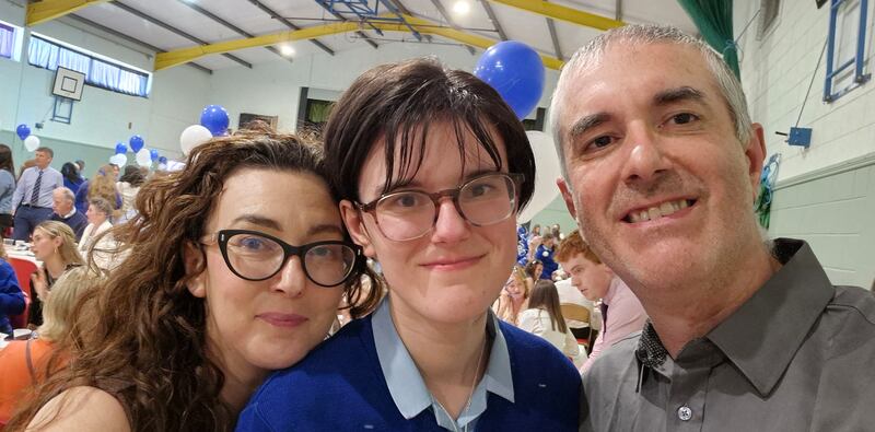 Damian Cullen with his wife and daughter at a recent school graduation ceremony