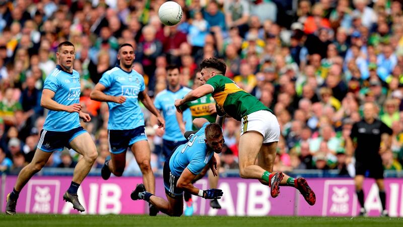 Jonny Cooper fouls David Clifford before being sent off during Dublin’s All-Ireland final draw with Kerry. Photograph: Ryan Byrne/Inpho