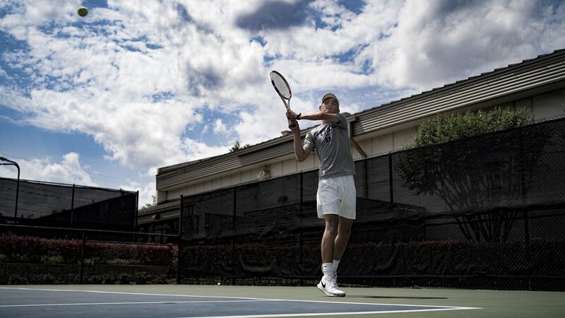 Will Grogan practices tennis. Photograph: Nitashia Jonson/The New York Times