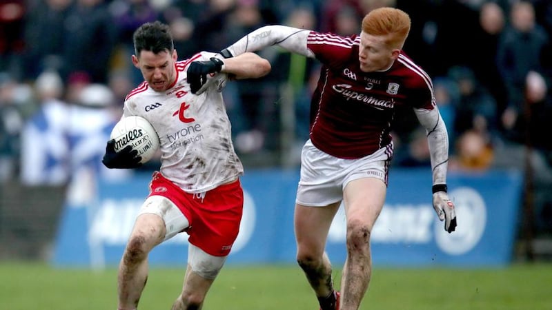Galway’s Peter Cooke challenges Matthew Donnelly of Tyrone during the Allianz League Division One game at Tuam Stadium. Photograph: Bryan Keane/Inpho
