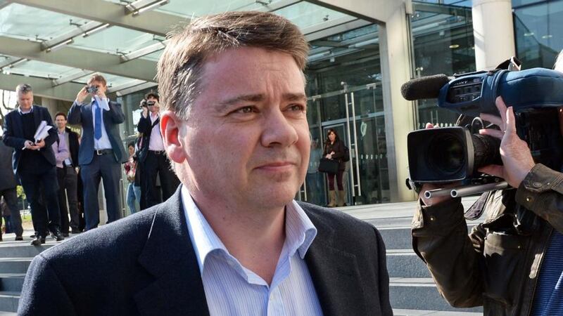 Pat Whelan, former director of Anglo Irish Bank, leaving the Dublin Circuit Criminal Court yesterday. Photograph: Eric Luke