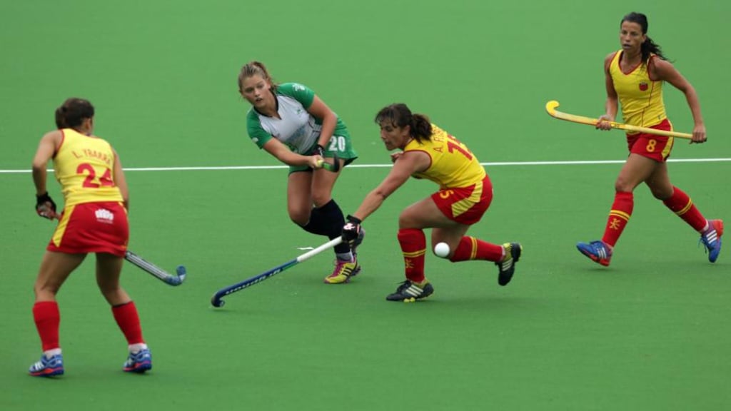 Ireland’s Chloe Watkins is challenged by Spain’s Anabel Flores during the European championship match at the Braxgata club, in Boom, Belgium. Photograph: Virginia Mayo/AP.