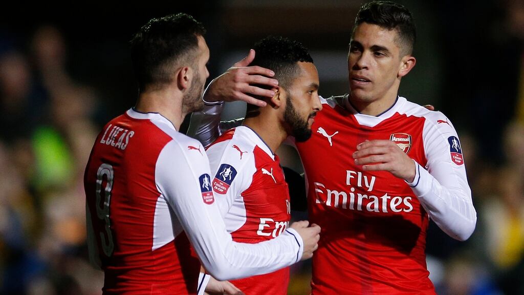 Theo Walcott celebrates scoring Arsenal’s second in the FA Cup fifth-round game against Sutton United at Gander Green Lane. Photograph: Andrew Couldridge/Action Images via Reuters/ Livepic
