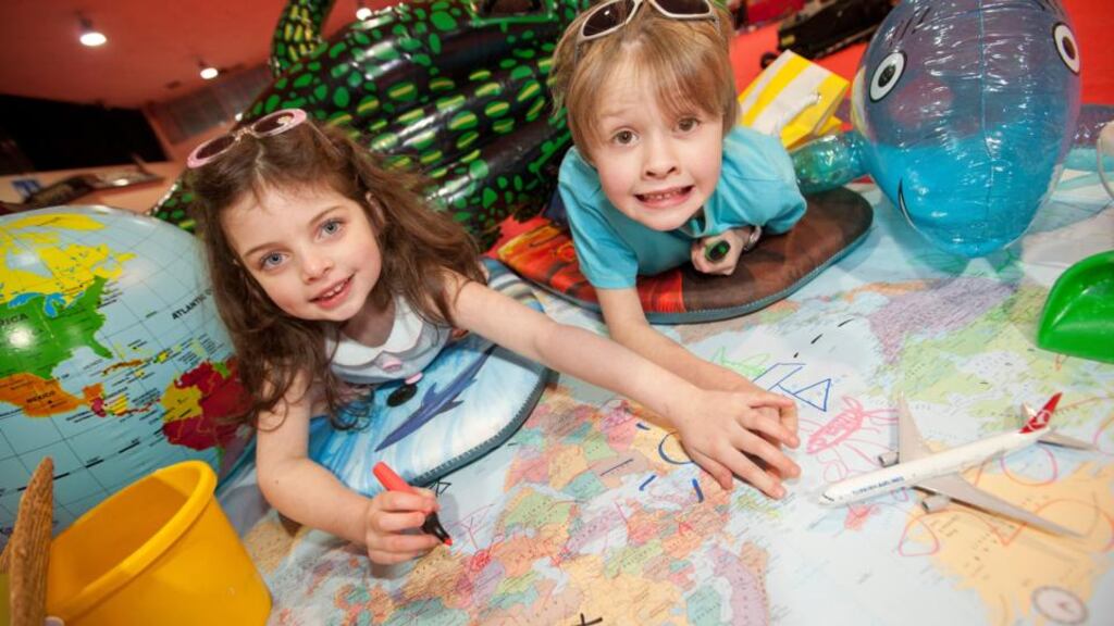 Cara Leigh Doyle (5) with Jonathan Howard (7) from Dublin atT he Holiday World Show Dublin. Photograph:
:Michael Donnelly