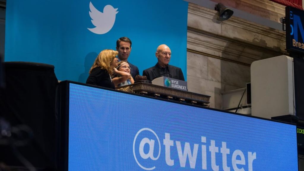 Vivienne Harr (centre) ringing the bell at the New York Stock Exchange when Twitter went public with actor Patrick Stewart (right). Photograph: Andrew Burton/Getty Images