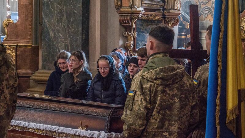 The funeral of Ukrainian soldier Ivan Myno in the garrison church of Saints Peter and Paul in Lviv. Photograph: Yaryna Chuchma