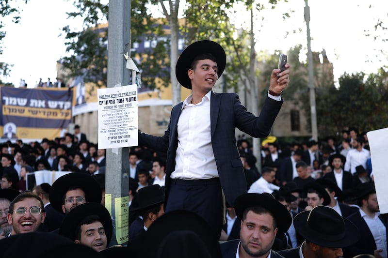 Ultra-Orthodox Jews attend a protest rally against army recruitment in Jerusalem. Photograph: Atef Safadi/EPA