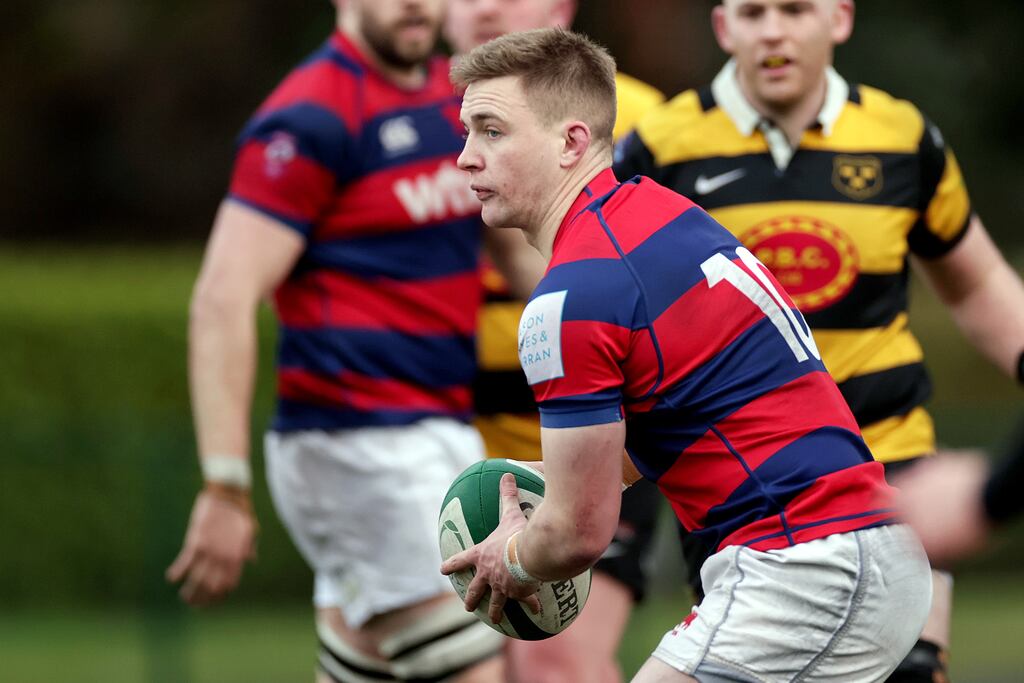 Clontarf's Conor Kelly scored off his own chip in his side's win over Ballynahinch. Photograph: Laszlo Geczo/Inpho