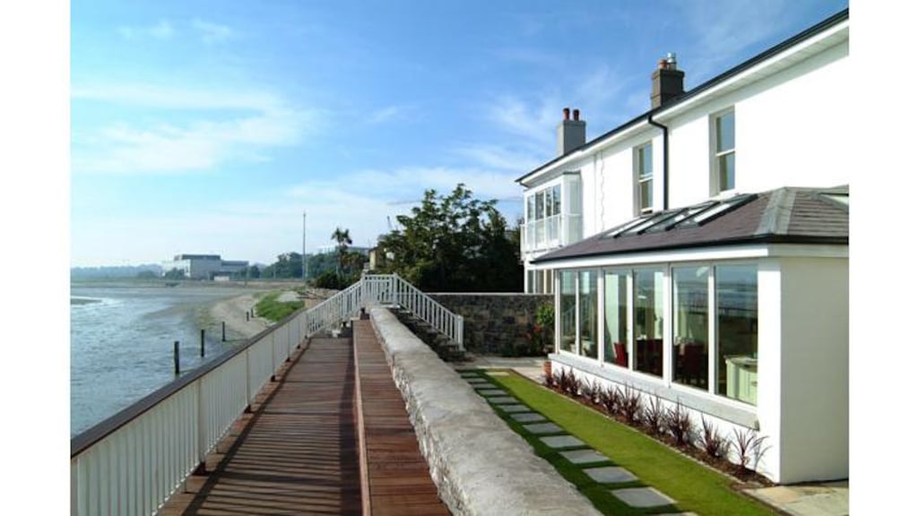 12 Strand Road, Sandymount: €4.25m for refurbished
five-bed which has has a manicured strip of garden and a timber
deck the width of the house. Steps lead down to the sea