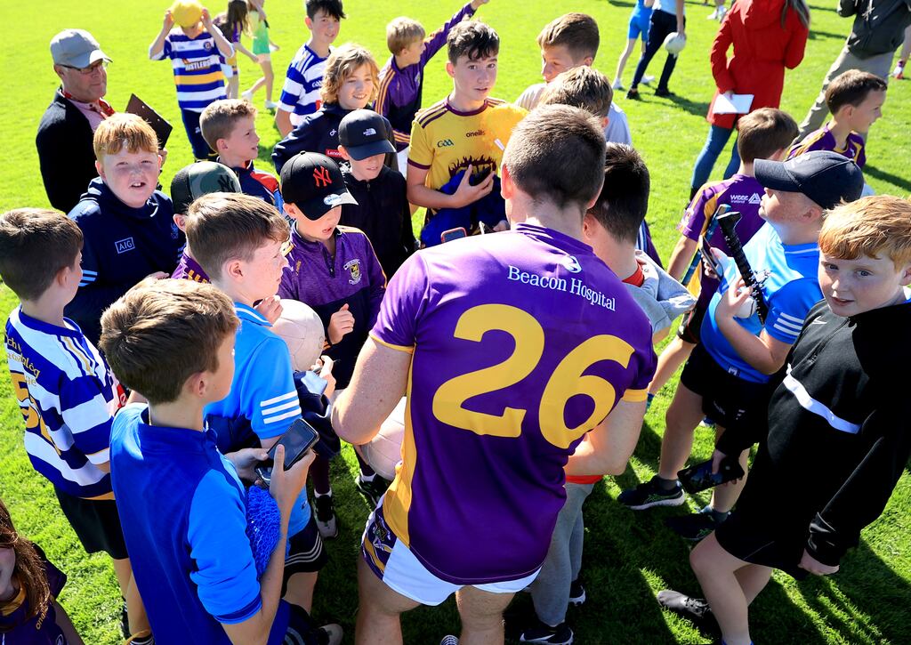 Shane Walsh with fans after his side, Kilmacud Crokes, beat Templeogue Synge Street in the Dublin Senior Football Championship at Parnell Park on Sunday. Photograph: James Crombie/Inpho