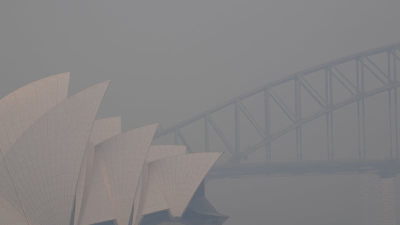 Thick smoke hangs in the sky in Sydney on Thursday. The smoke comes from the Gospers Mountain fire north west of Sydney, which has been burning for over a week now, and has burnt more than 160,000 hectares of land. Photograph: Dean Lewins/EPA