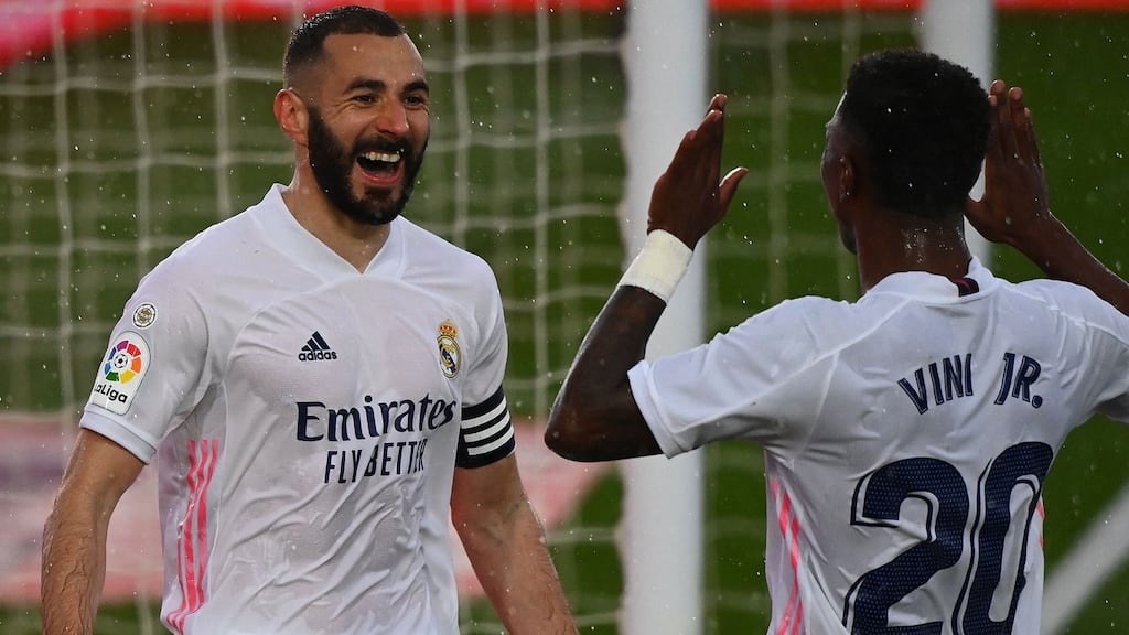 Karim Benzema celebrates a goal against SD Eibar with  Vinicius Junior. “People talk about Karim as a pure No 9, a 9 and a half, a 10; for me, he’s a bit of everything,” Zidane says. “I would define him as a total footballer.” Photograph: Gabriel Bouys/AFP/Getty Images