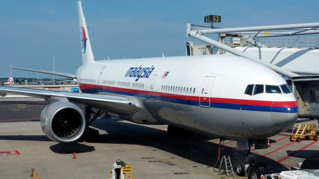Malaysia Airlines Boeing 777-200ER with registration 9M-MRD operating as flight MH17 is seen at the G3 gate of Schiphol Airport in Amsterdam before it took off for Kuala Lumpur. Photograph: Yaron Mofaz/Reuters)