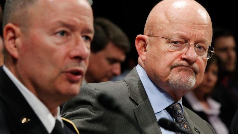 General Keith Alexander, director of the National Security Agency (NSA) testifies at a House Intelligence Committee hearing in Washington DC. Director of national intelligence James Clapper watches on at right. Photograph: Jason Reed/Reuters