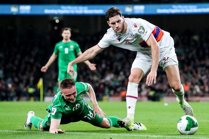 Ireland's Will Smallbone and Styopa Mkrtchyan of Armenia. Photograph: Nick Elliott/Inpho