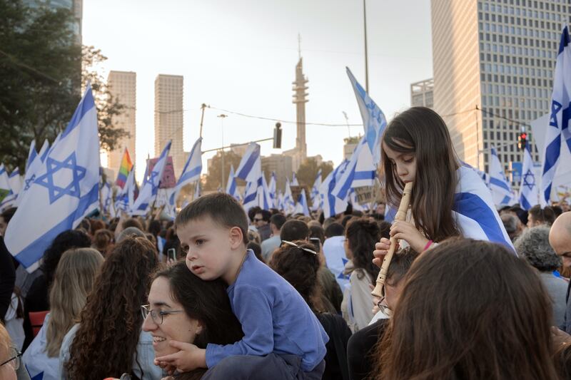 Young children at an anti-government demonstration in Tel Aviv. Photograph: Amit Elkayam/The New York Times