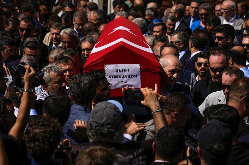People attend the funeral prayers for Aysenur Ezgi Eygi outside the central mosque of Didim (Khalil Hamra/AP/PA)