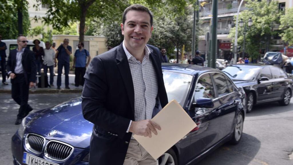 Greek Prime Minister Alexis Tsipras arrives for a political meeting at his party headquarters in Athens on June 9th, 2015. Cash-strapped Greece submitted a new reform plan to its EU-IMF creditors as Tsipras warned the lack of a deal would lead to the collapse of the eurozone. (Photograph: LOUISA GOULIAMAKILOUISA GOULIAMAKI/AFP/Getty Images)