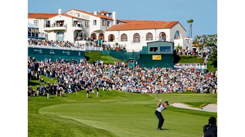 American John Merrick plays his approach to the last on his way to victory in the Northern Trust Open at the Riviera Country Club in Los Angeles on Sunday.