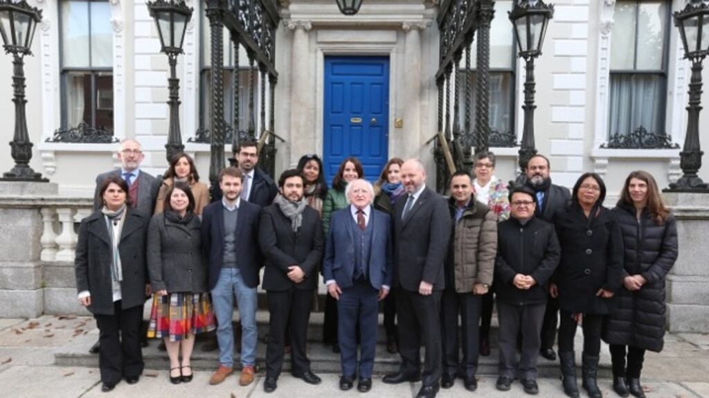 President Michael D Higgins with  international activists and NGO representatives in Dublin at the launch of the Human Rights Defenders Memorial. Photograph: Conor McCabe
