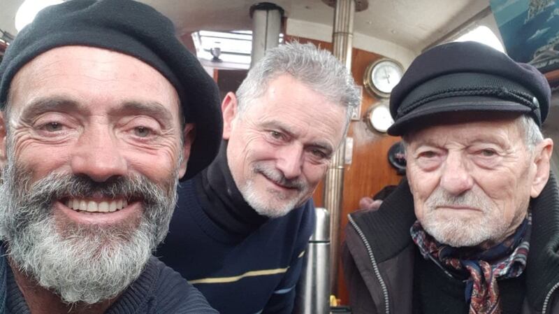 Juan Manuel Ballestero (front) with his brother Carlos Alberto  and their father, also  Carlos Alberto, after his arrival in Argentina having sailed across the Atlantic. Photograph: Juan Manuel Ballestero via New York Times
