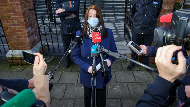 Harassment victim Una Ring from Roscarberry at Cork Circuit Criminal Court, flanked by Sergeant John Sharkey and Insp Eoghan Healy.Photograph: Daragh Mc Sweeney/Cork Courts Limited