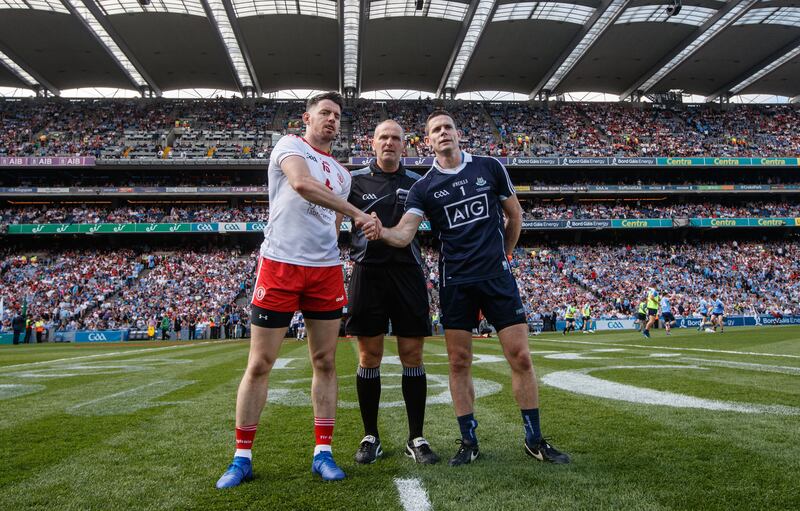 Tyrone's Matthew Donnelly and Stephen Cluxton of Dublin with referee Conor Lane at the coin toss before the 2018 All-Ireland final. Photograph: James Crombie/Inpho