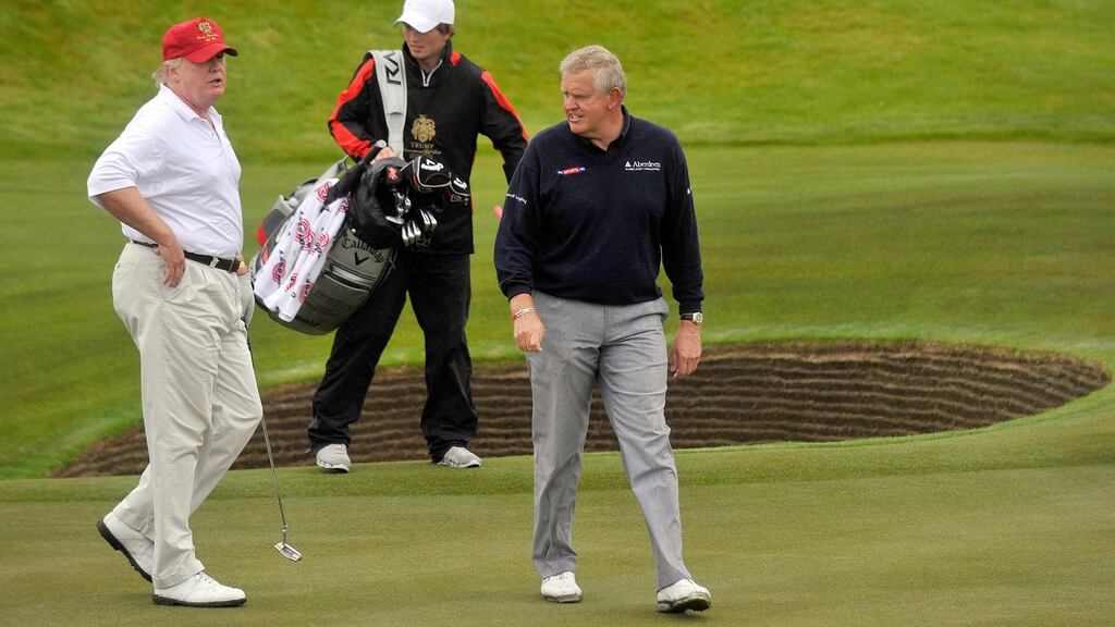 Donald Trump plays a round of golf with Scottish golfer Colin Montgomerie as he officially opens his new multi-million pound Trump International Golf Links course in Aberdeenshire, Scotland, on July 10th, 2012. Photo: Getty Images