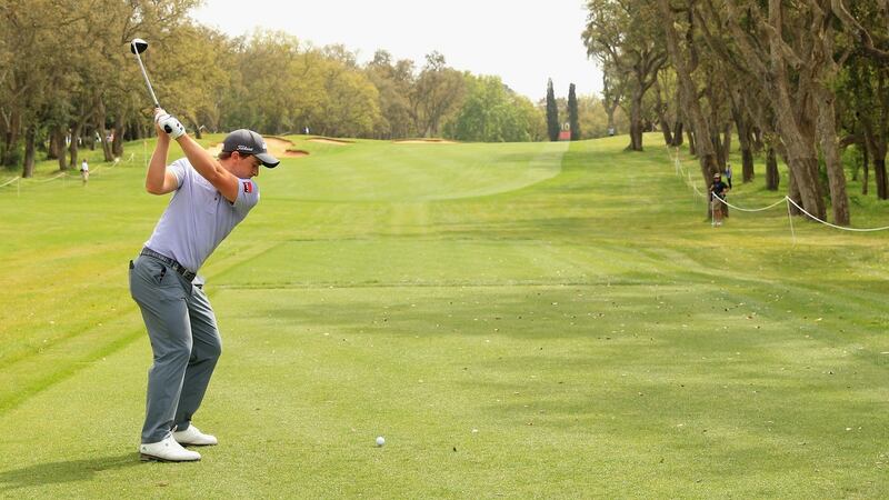 Paul Dunne tees of the 10th hole. Photo: Andrew Redington/Getty Images