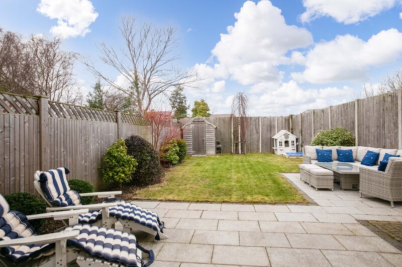 The patio was extended in the rear garden for entertaining.