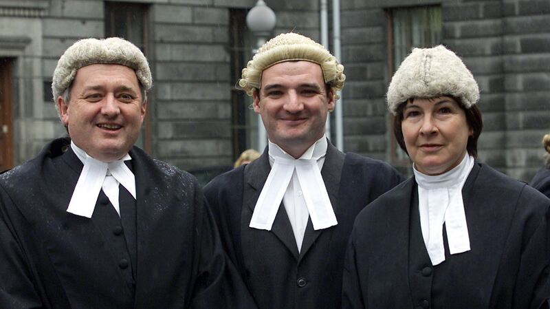 Mr Justice Adrian Hardiman and his wife retired Circuit Court judge Yvonne Murphy with their son Eoin, when he was called to the Bar in 2002.