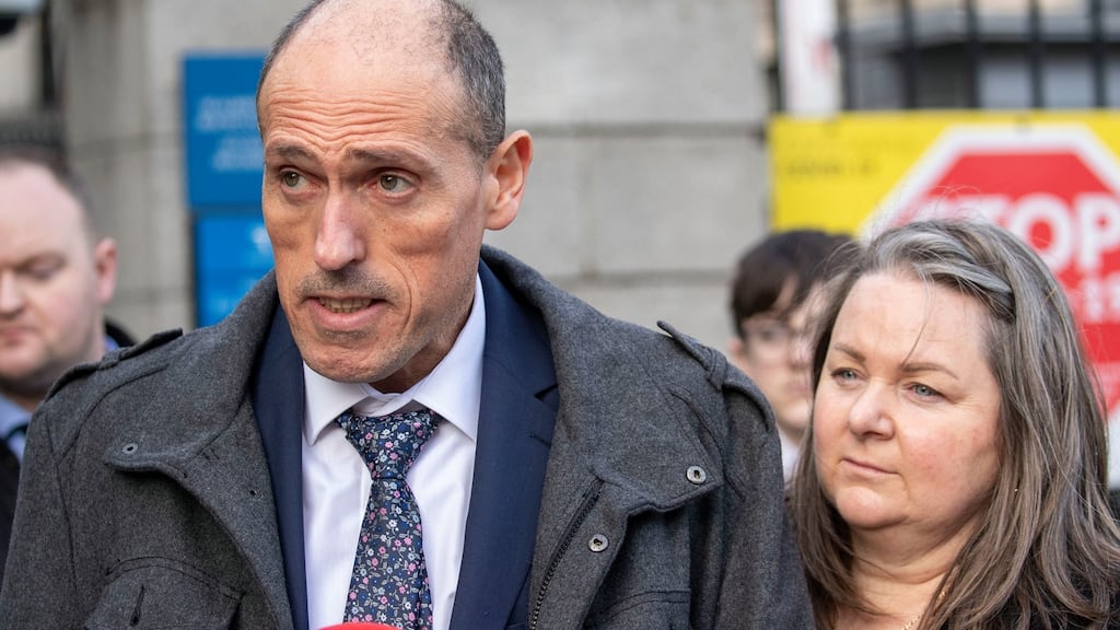 Gino Appezzato (50), from Muckalee, Co Kilkenny, with his wife Kelli, speaking to media outside the Four Courts. Photograph: Collins Courts